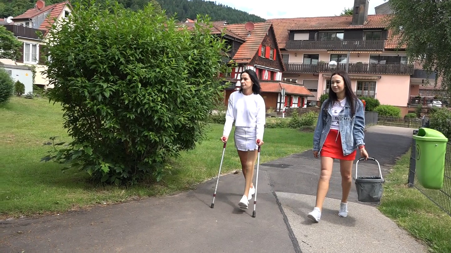Julia and Teona Walking with Prostheses